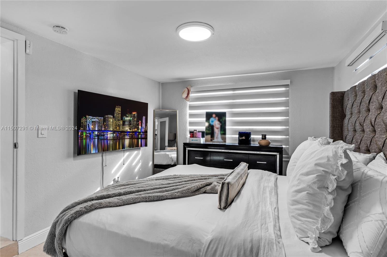 West Little River Miami, FL 33147 - Photo 15 of 29 a living room with furniture and a flat screen tv