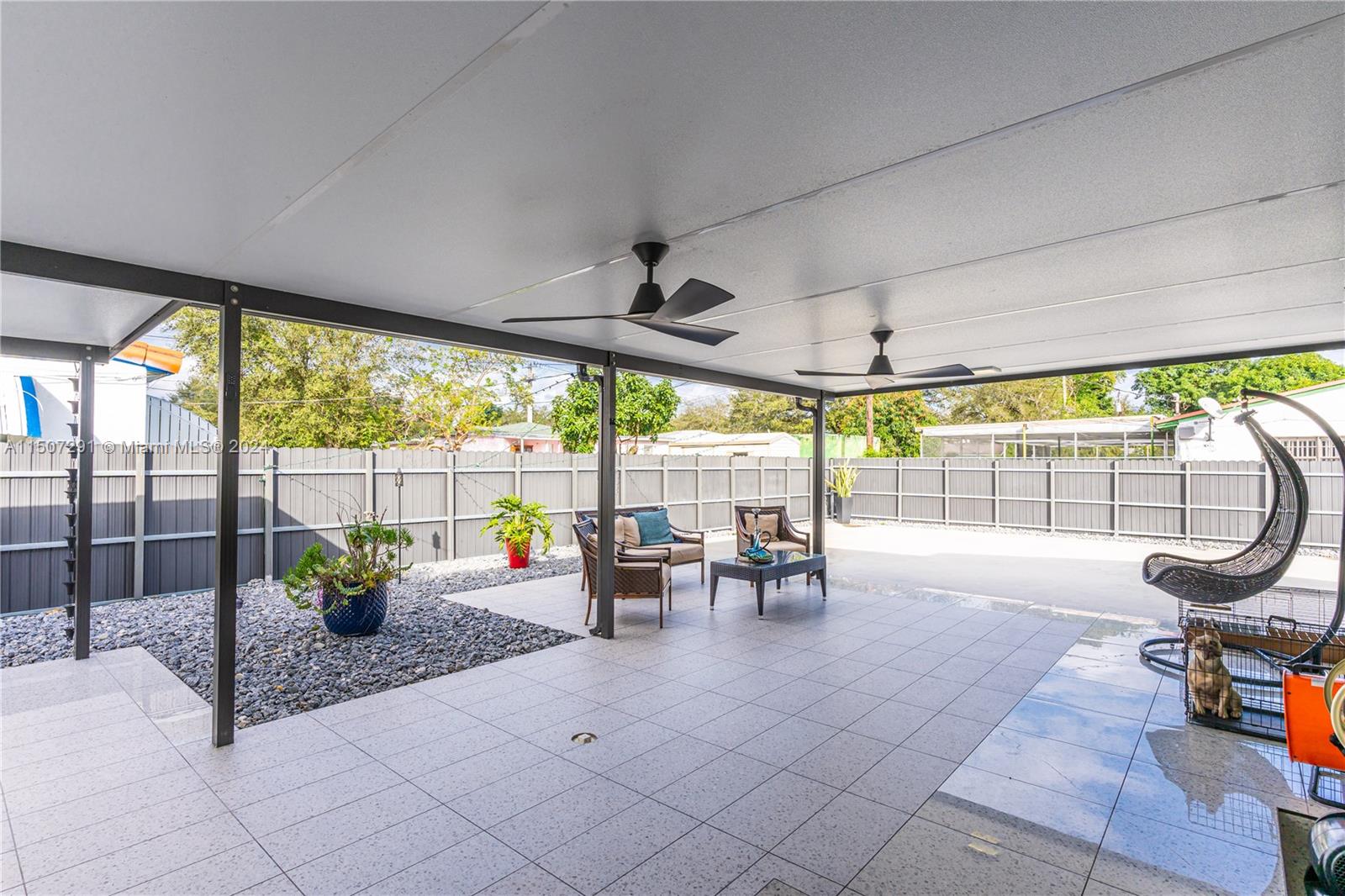 West Little River Miami, FL 33147 - Photo 27 of 29 a living room with furniture and a garden