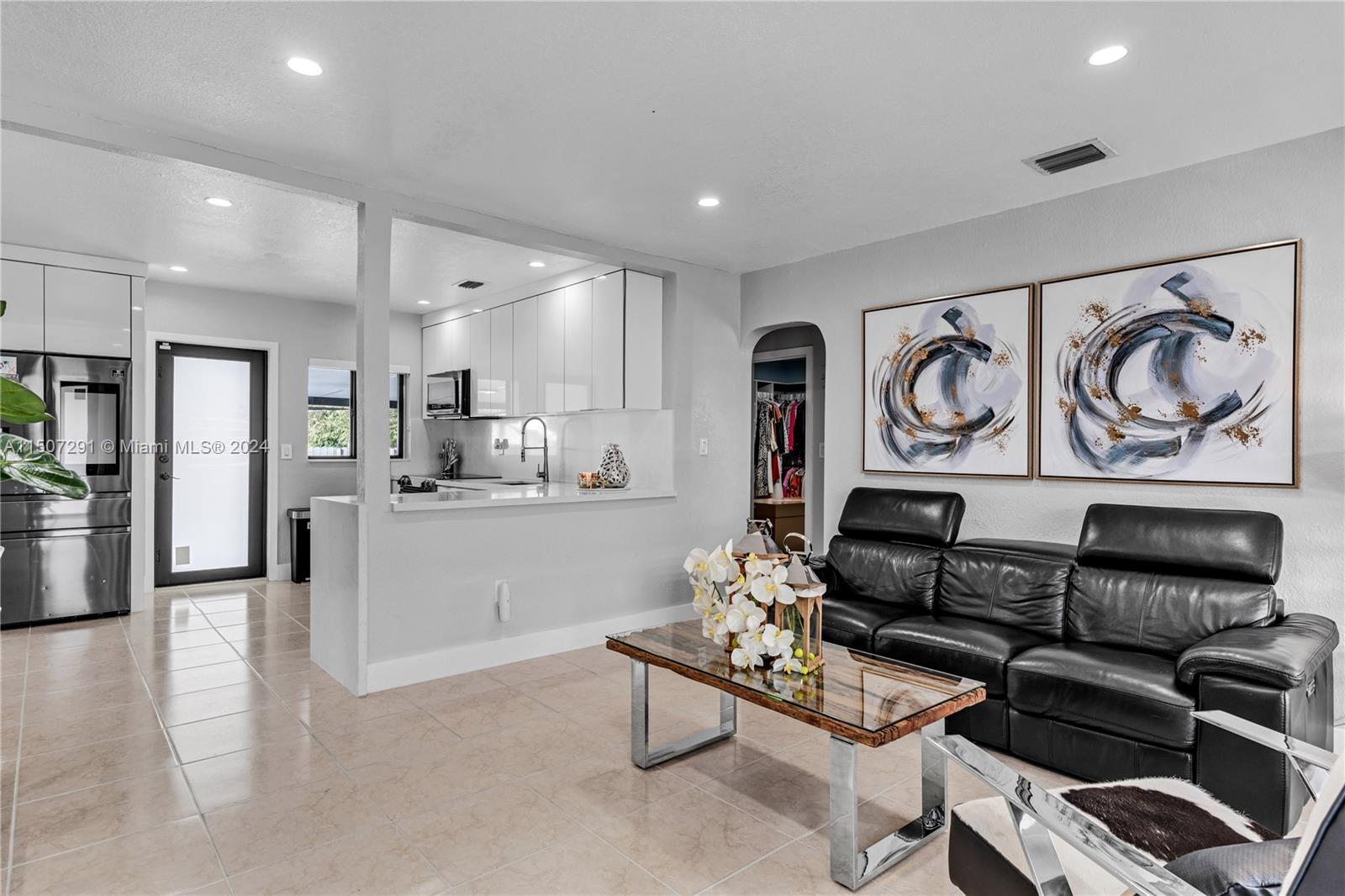 West Little River Miami, FL 33147 - Photo 9 of 29 a living room with furniture and kitchen view