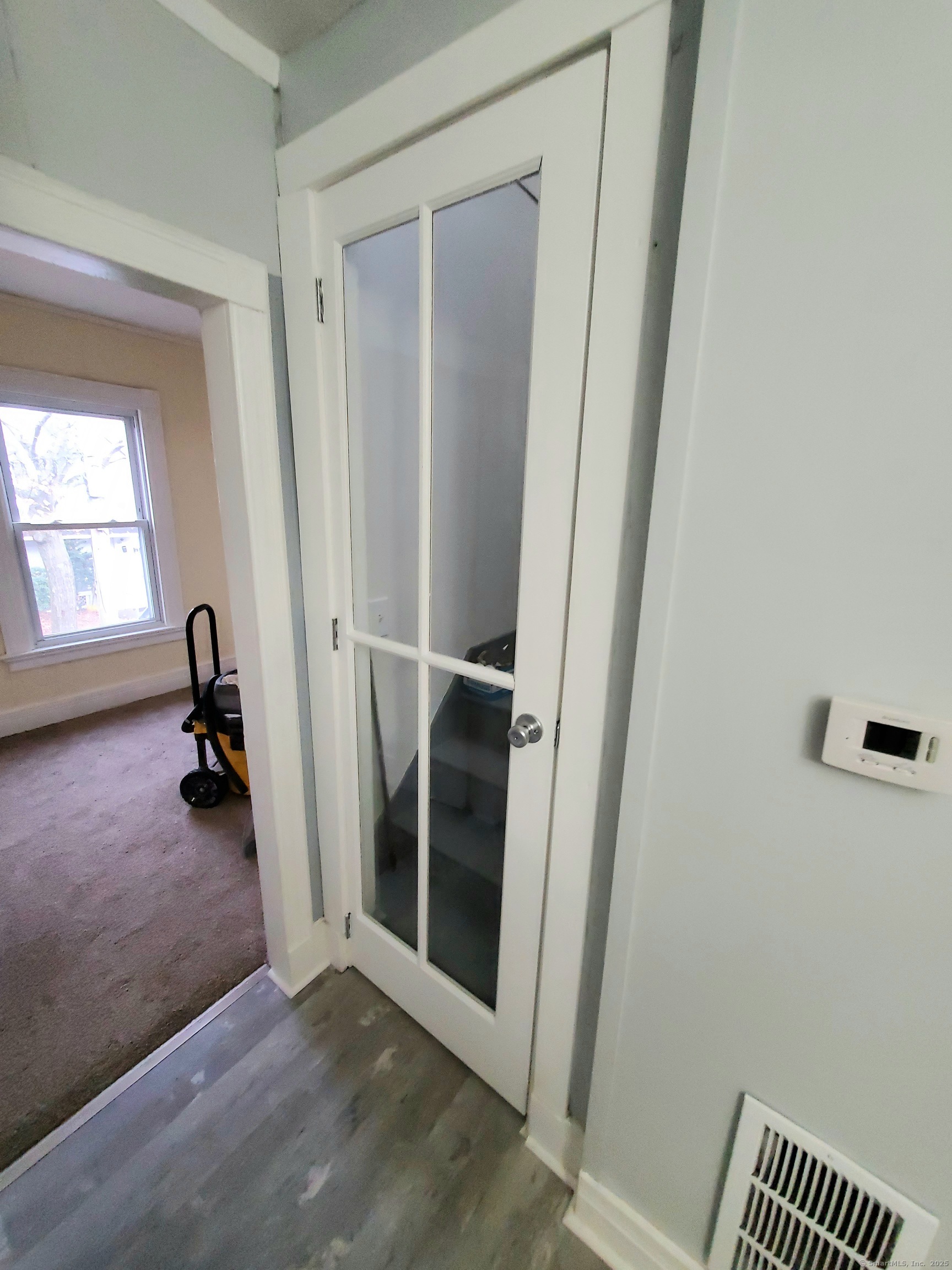 402 Huntington Street New Haven, CT 06511 - Photo 3 of 12 a view of a hallway view with staircase