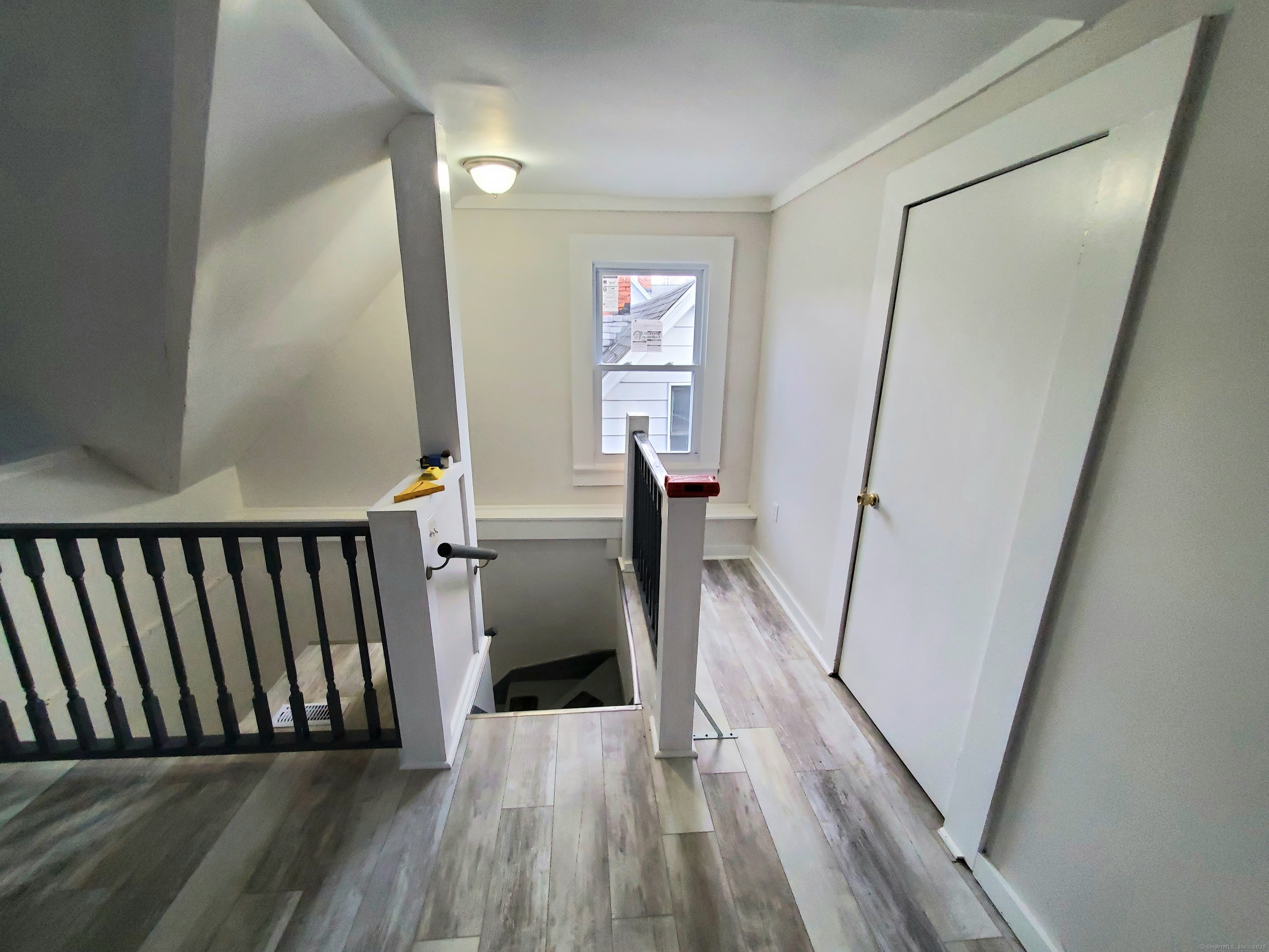 402 Huntington Street New Haven, CT 06511 - Photo 4 of 12 a view of entryway with wooden floor
