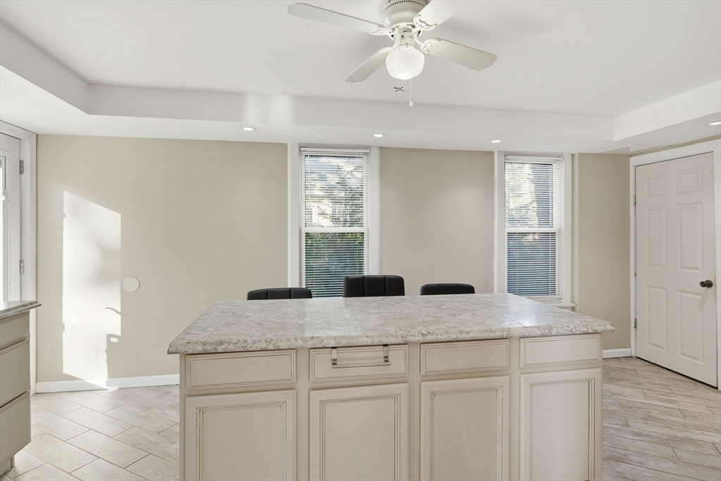 73 Maple Terrace West Springfield, MA 01089 - Photo 14 of 41 a view of kitchen with granite countertop cabinets and window