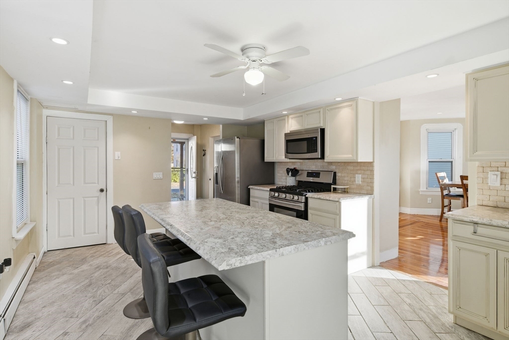 73 Maple Terrace West Springfield, MA 01089 - Photo 15 of 41 a kitchen with granite countertop counter space a sink appliances and cabinets