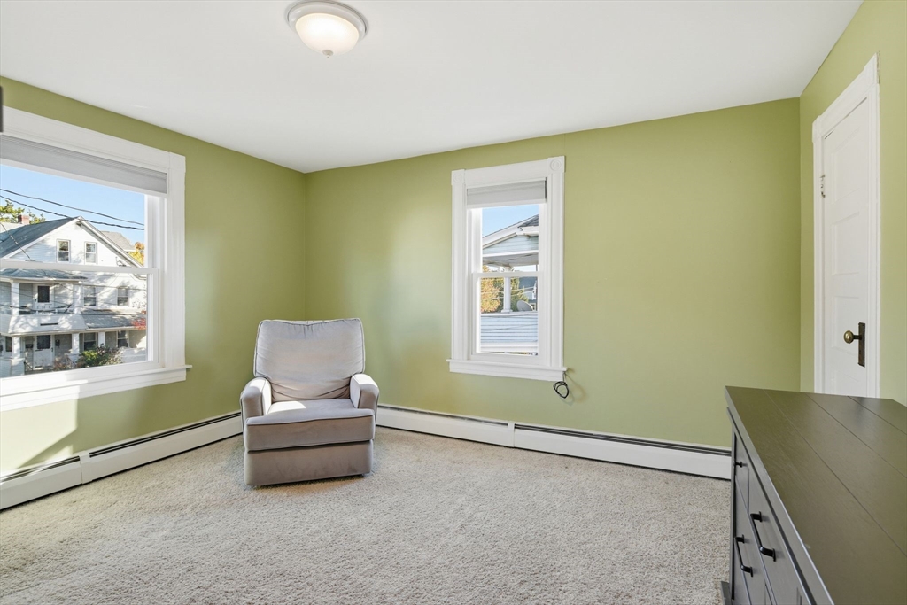 73 Maple Terrace West Springfield, MA 01089 - Photo 19 of 41 a living room with furniture and a window