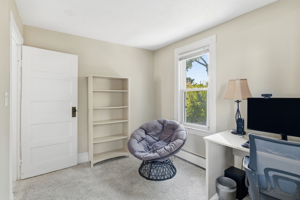 73 Maple Terrace West Springfield, MA 01089 - Photo 25 of 41 a living room with furniture a window and a flat screen tv