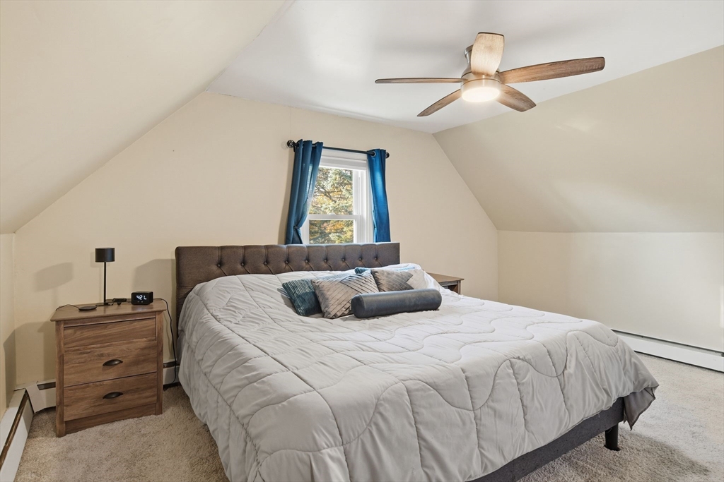 73 Maple Terrace West Springfield, MA 01089 - Photo 32 of 41 a bedroom with a bed and a dresser