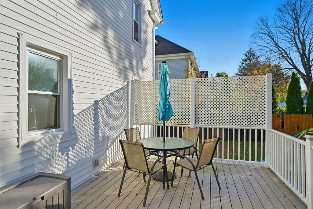 73 Maple Terrace West Springfield, MA 01089 - Photo 34 of 41 a view of a wooden chairs on the deck