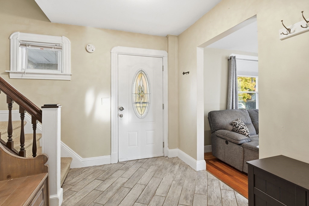 73 Maple Terrace West Springfield, MA 01089 - Photo 4 of 41 a view of a hallway with furniture and wooden floor