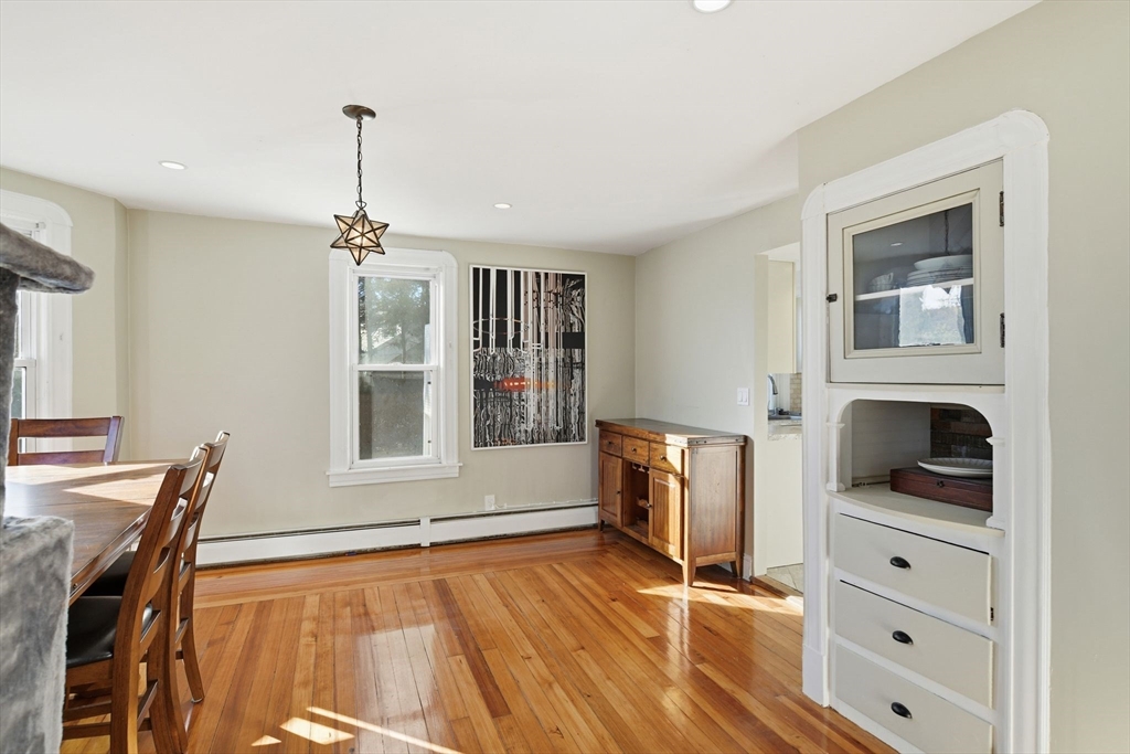 73 Maple Terrace West Springfield, MA 01089 - Photo 7 of 41 a view of a livingroom with furniture a fireplace and wooden floor