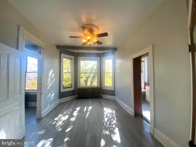 a view of an empty room and window