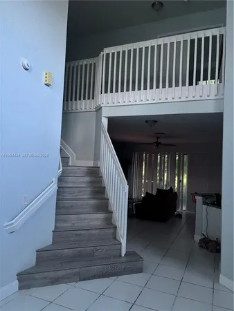 a view of entryway with a front door