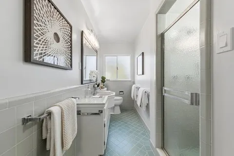 a bed room with a bed and a couch