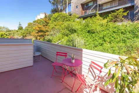 a view of a terrace with furniture