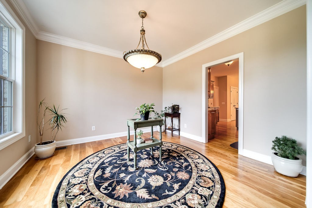 181 Dry Fork Road South Bethpage, TN 37022 - Photo 11 of 52 a view of a room with a table and chairs