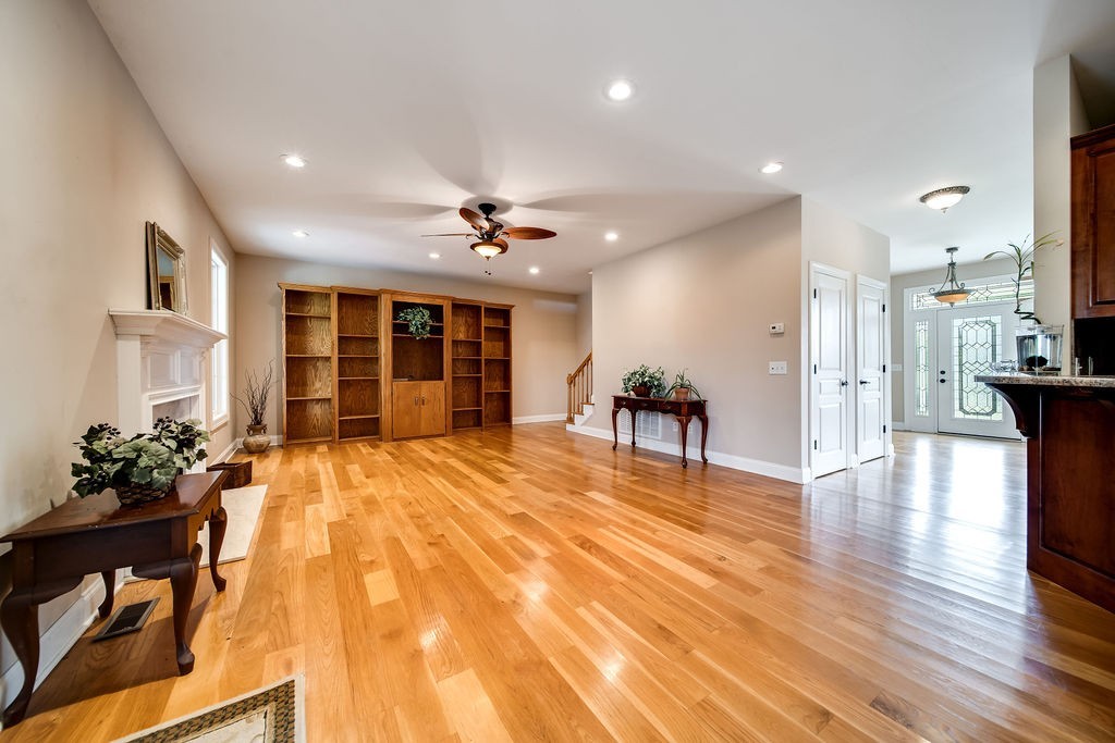 181 Dry Fork Road South Bethpage, TN 37022 - Photo 12 of 52 a view of an empty room with wooden floor and a kitchen
