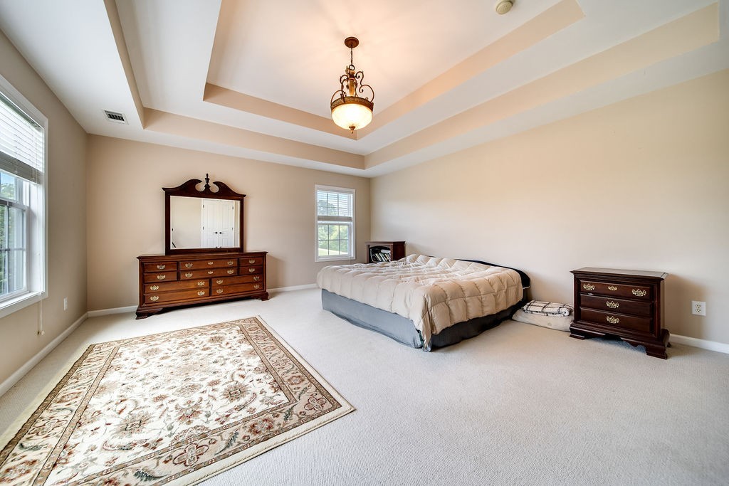 181 Dry Fork Road South Bethpage, TN 37022 - Photo 24 of 52 a bedroom with a bed and a couch