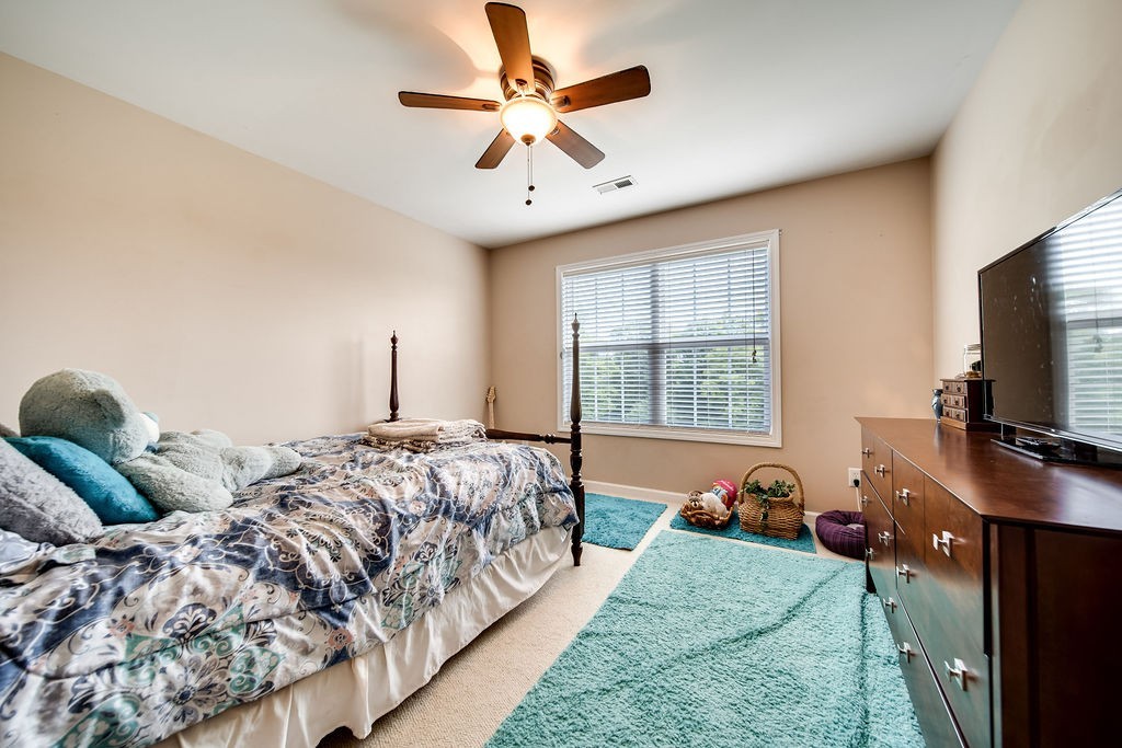 181 Dry Fork Road South Bethpage, TN 37022 - Photo 34 of 52 a bedroom with bed tv and window