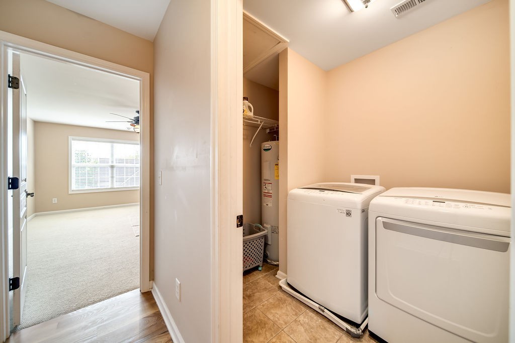 181 Dry Fork Road South Bethpage, TN 37022 - Photo 36 of 52 a view of storage and utility room with washer and dryer