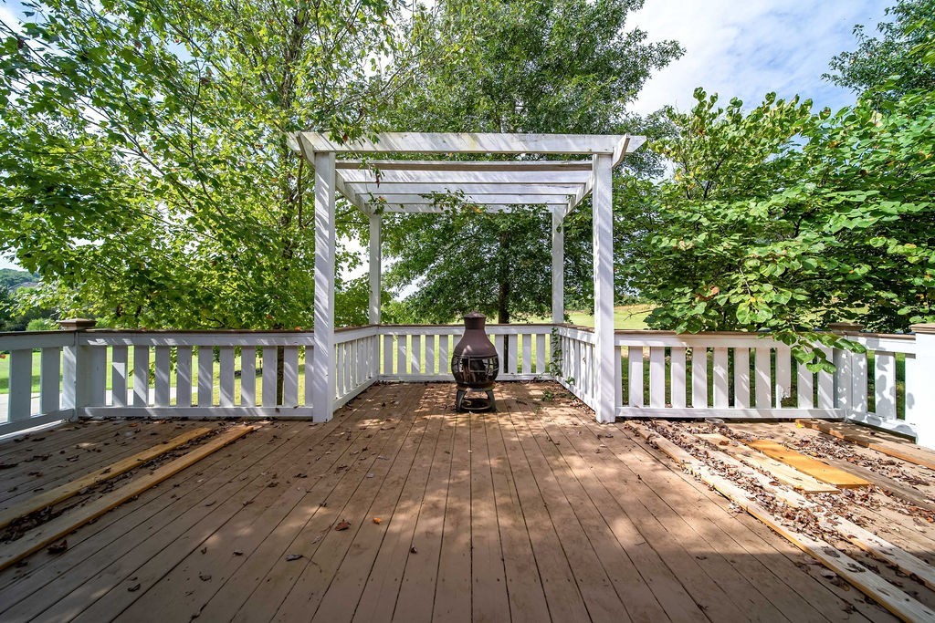 181 Dry Fork Road South Bethpage, TN 37022 - Photo 42 of 52 a view of balcony with wooden floor and fence