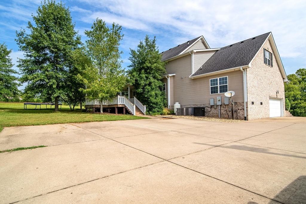 181 Dry Fork Road South Bethpage, TN 37022 - Photo 51 of 52 a front view of a house with a yard