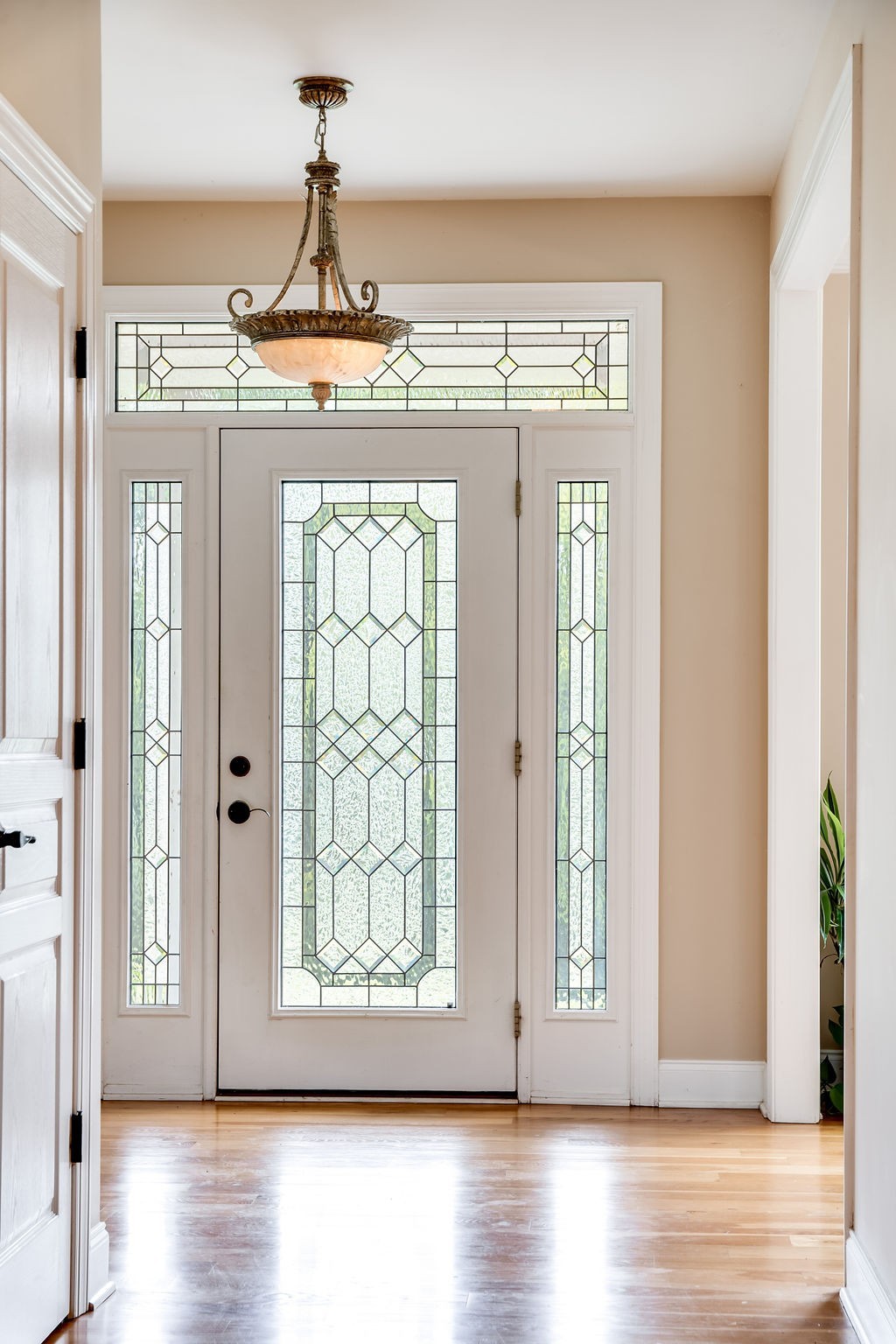181 Dry Fork Road South Bethpage, TN 37022 - Photo 8 of 52 a view of a hallway with wooden floor and windows