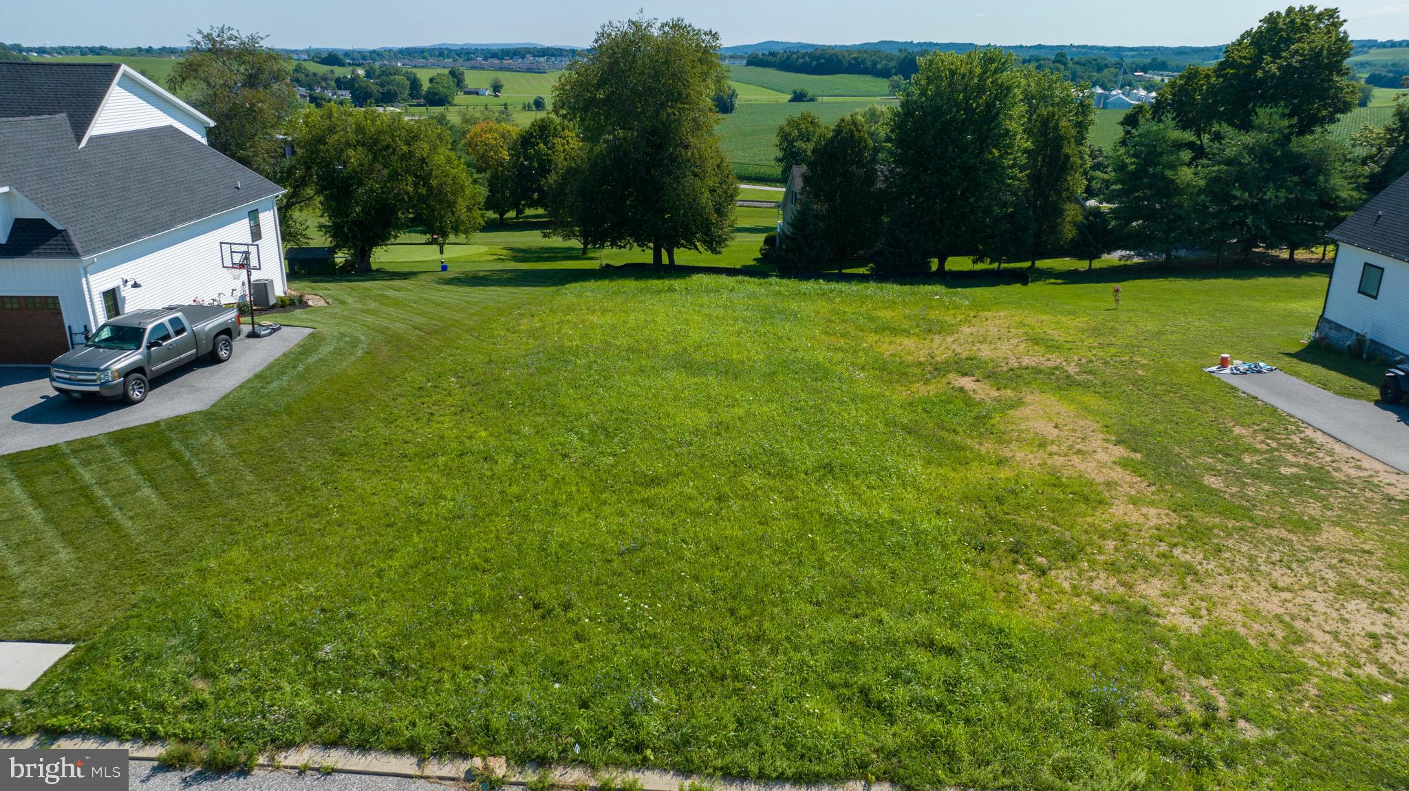 544 Monocacy Trail Spring Grove, PA 17362 - Photo 2 of 9 a view of a backyard with large trees