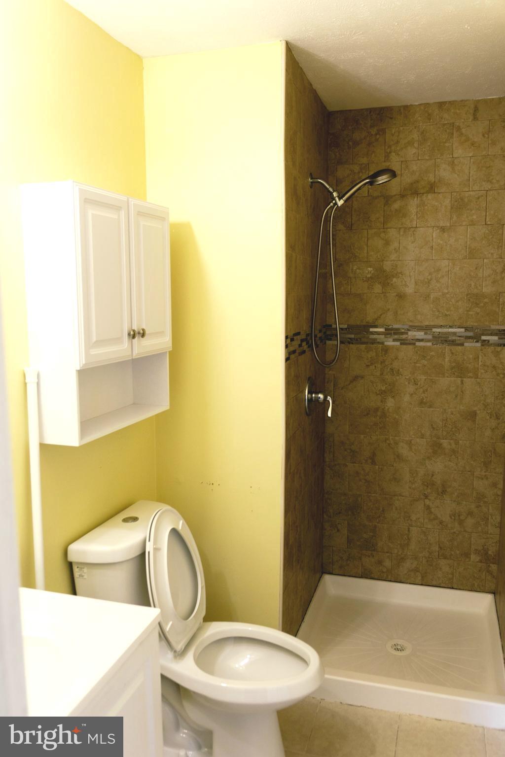 2323 Bluegrass Heights Court Rosedale, MD 21237 - Photo 14 of 14 a bathroom with a toilet and a sink