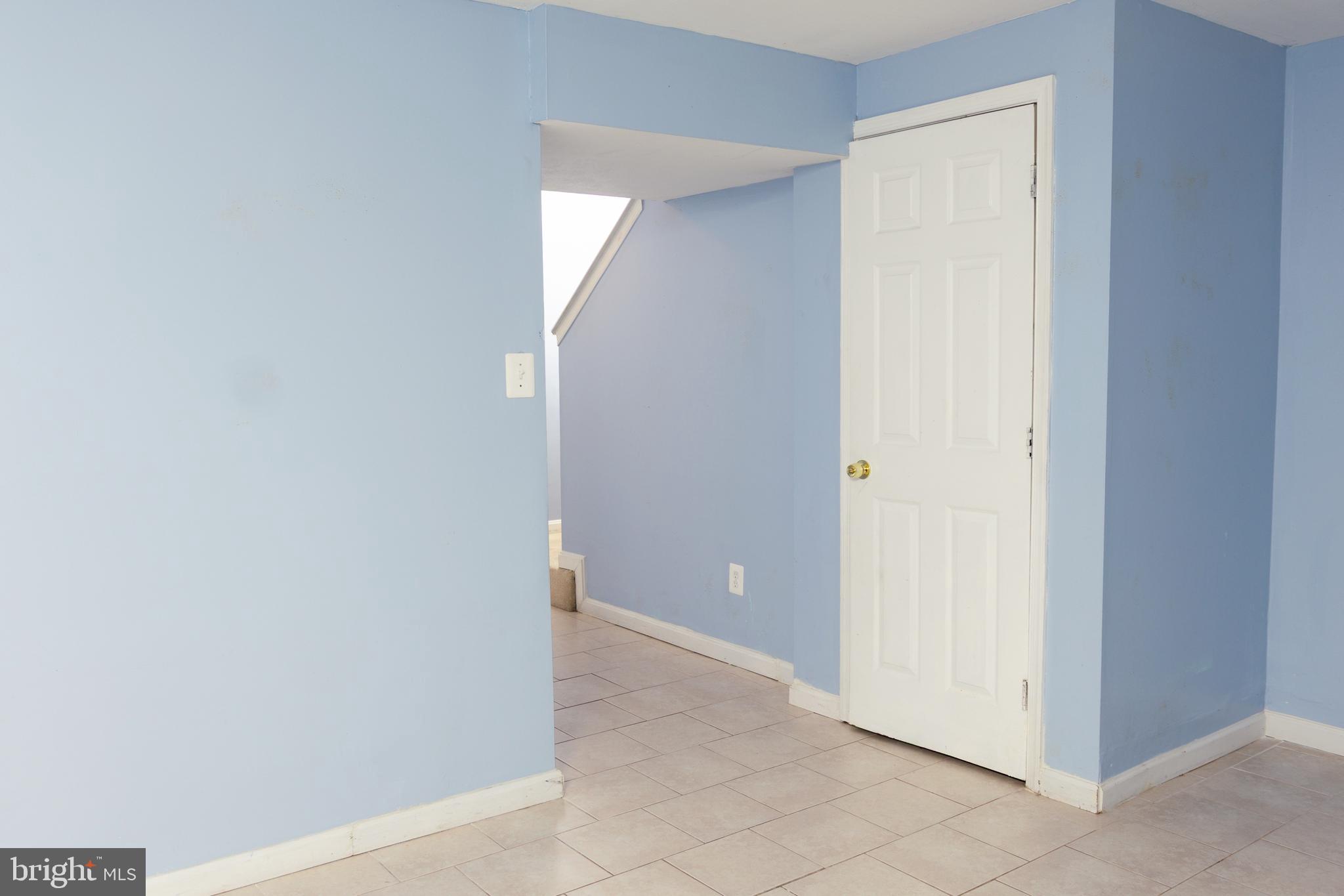 2323 Bluegrass Heights Court Rosedale, MD 21237 - Photo 5 of 14 an empty room with closet and a bathroom