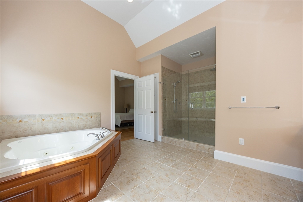 2 Powers Road Mendon, MA 01756 - Photo 22 of 40 a bathroom with a bathtub and a shower