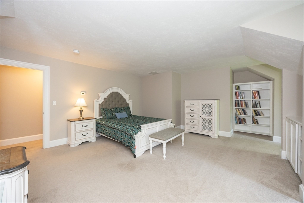 2 Powers Road Mendon, MA 01756 - Photo 29 of 40 a bedroom with a bed and a window