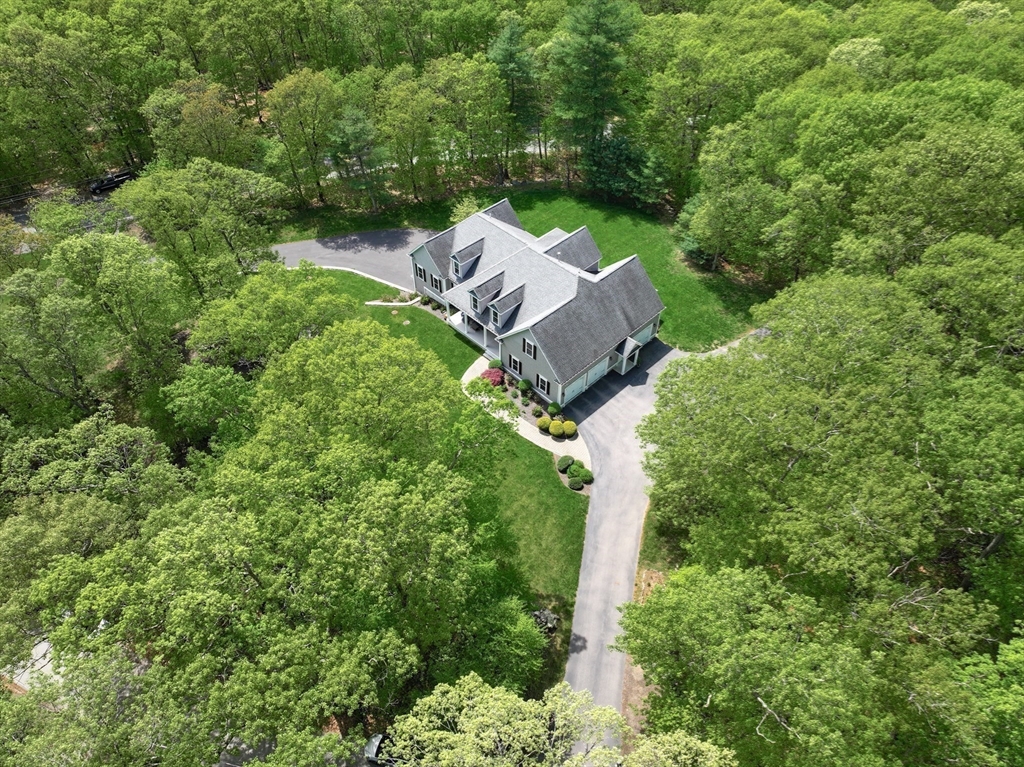 2 Powers Road Mendon, MA 01756 - Photo 38 of 40 an aerial view of a house with a yard patio and outdoor seating