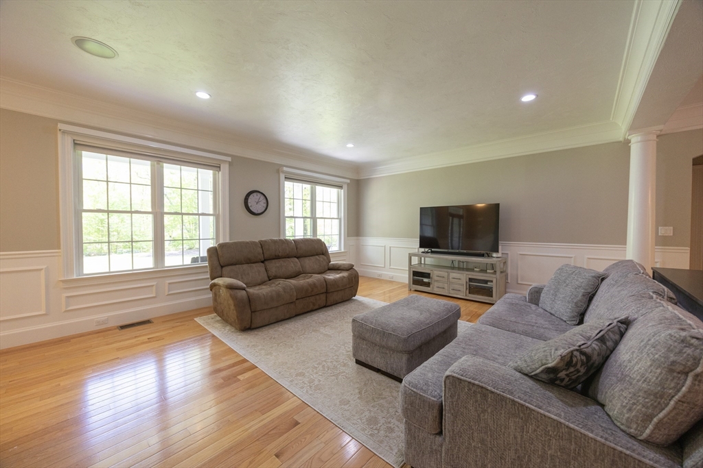 2 Powers Road Mendon, MA 01756 - Photo 10 of 40 a living room with furniture and a flat screen tv