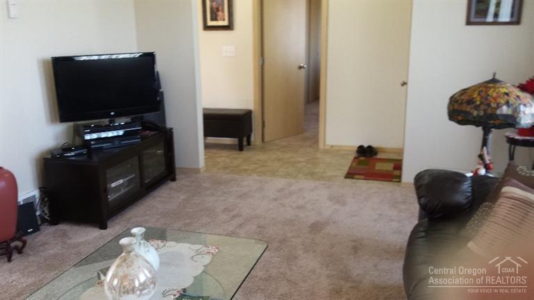 3864 Rimrock Acres Loop Prineville, OR 97754 - Photo 8 of 25 living room and hall from the propane st
