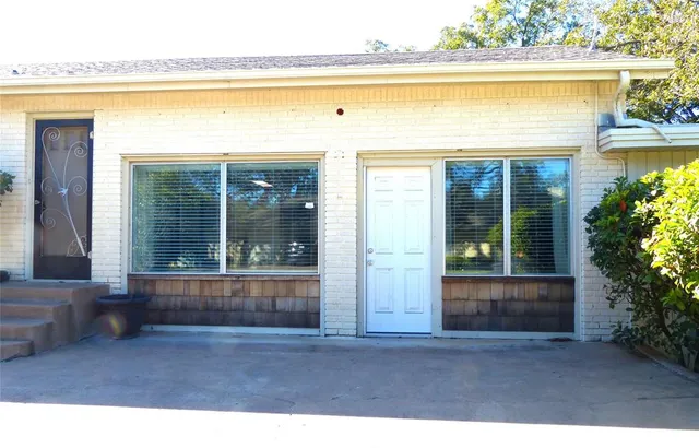 a view of backyard with porch
