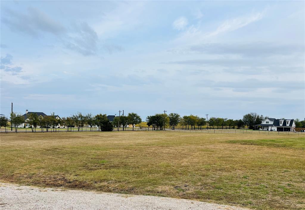 1883 Jc Maples Road Gunter, TX 75058 - Photo 4 of 12 a view of a lake with houses in big room