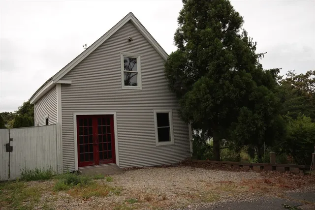 a view of an empty room with stairs