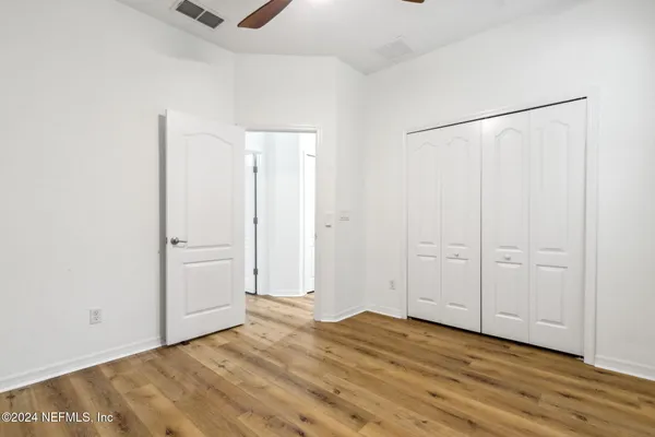a view of a room that has a window in it
