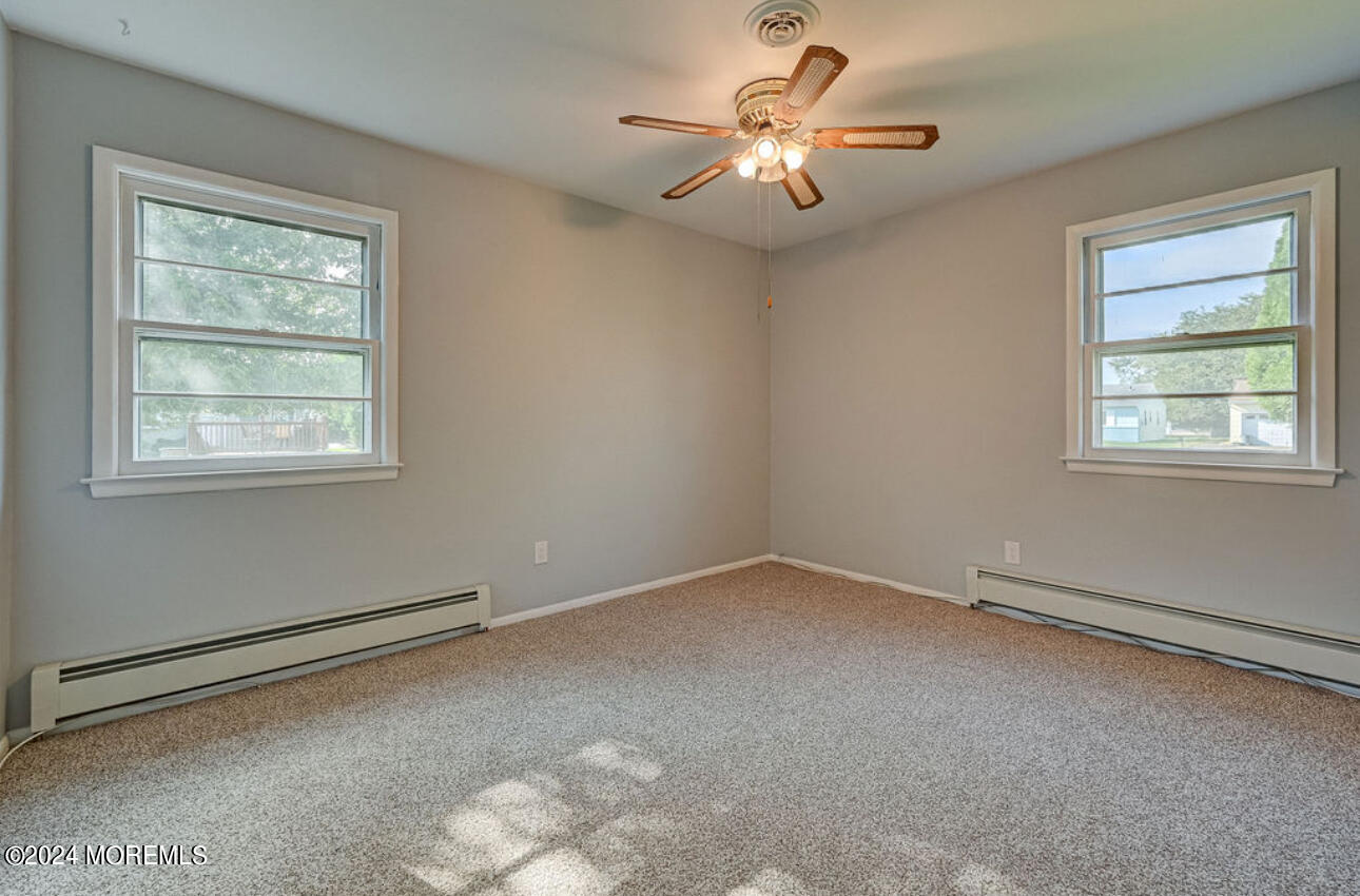 5 Coventry Road Toms River, NJ 08757 - Photo 18 of 27 a view of an empty room with a window