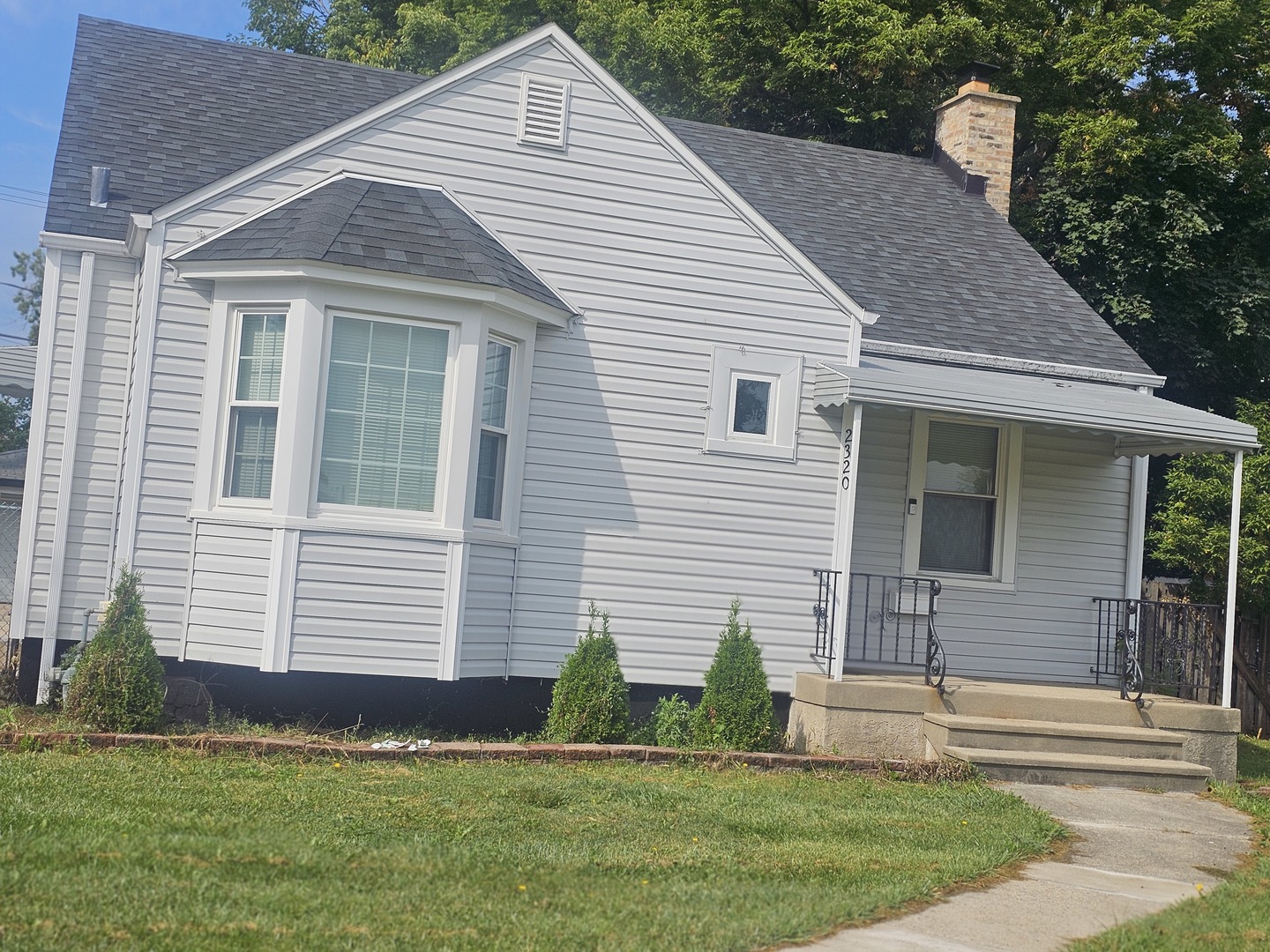 2320 South 9th Avenue Broadview, IL 60155 - Photo 1 of 10 a front view of a house with a yard
