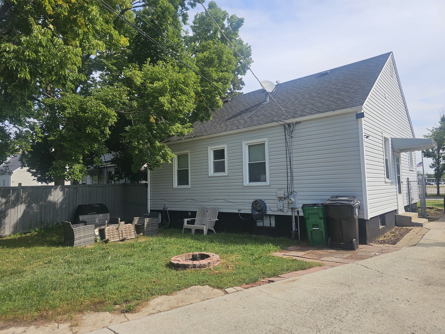 2320 South 9th Avenue Broadview, IL 60155 - Photo 2 of 10 a front view of a house with a garden and plants