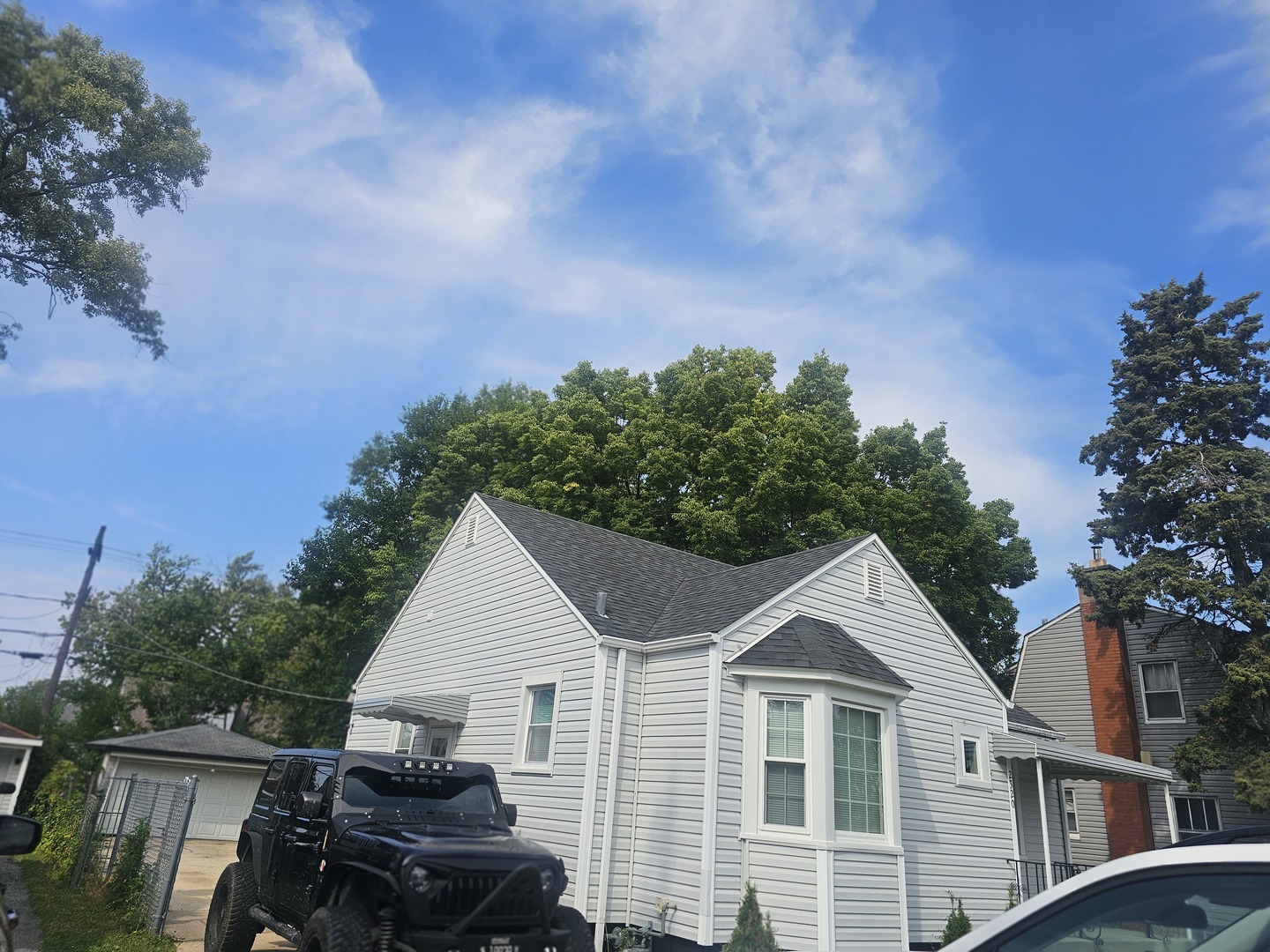 2320 South 9th Avenue Broadview, IL 60155 - Photo 3 of 10 a front view of a house with a yard