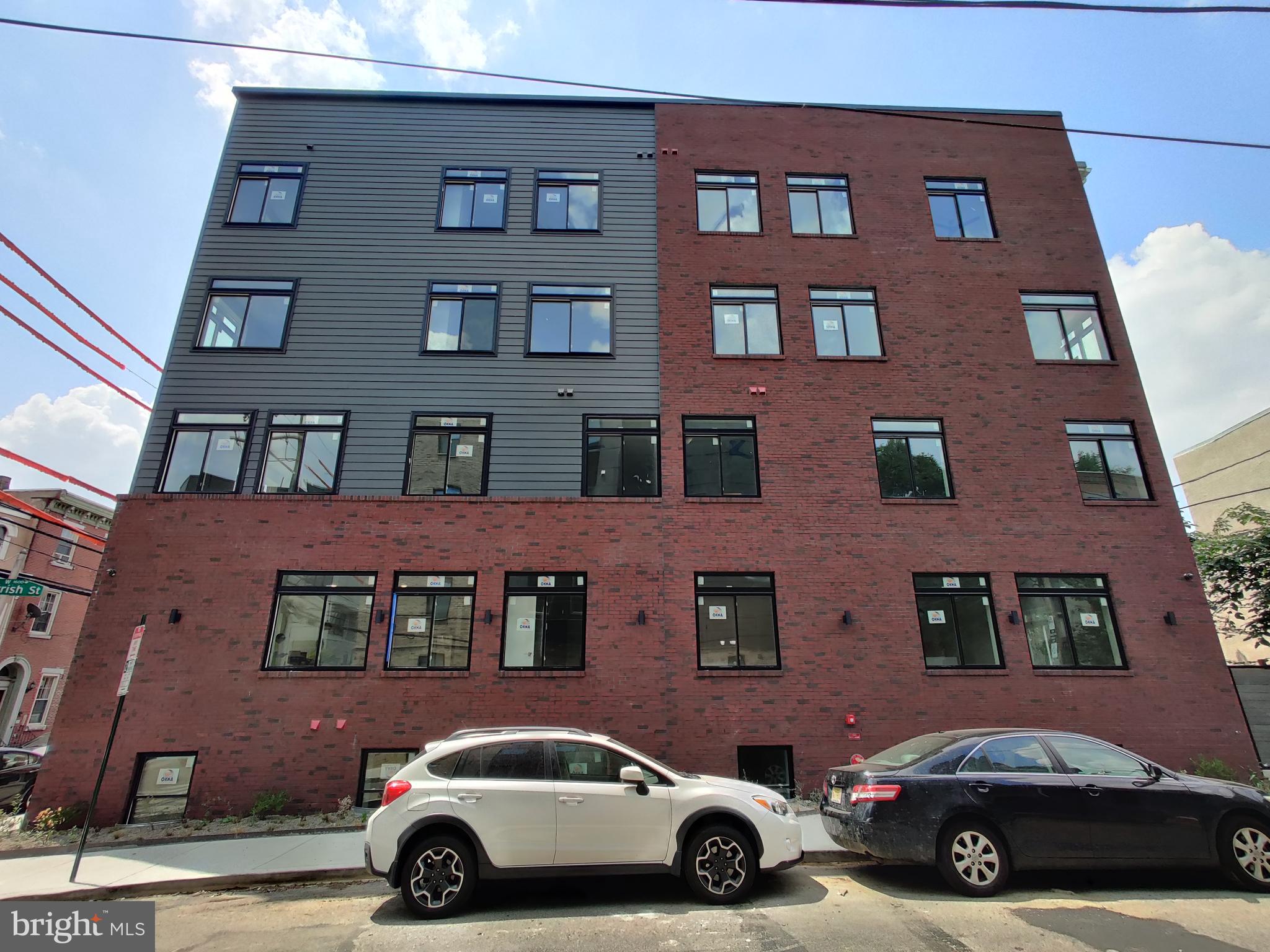 812 North 16th Street, Unit 6 Philadelphia, PA 19130 - Photo 8 of 9 a car parked in front of a building