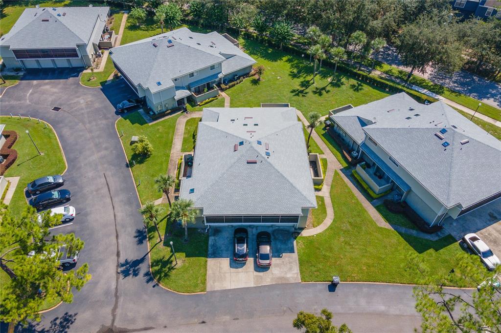 4413 Ring Neck Road, Unit 4413 Orlando, FL 32808 - Photo 21 of 24 an aerial view of a house with yard swimming pool and outdoor seating