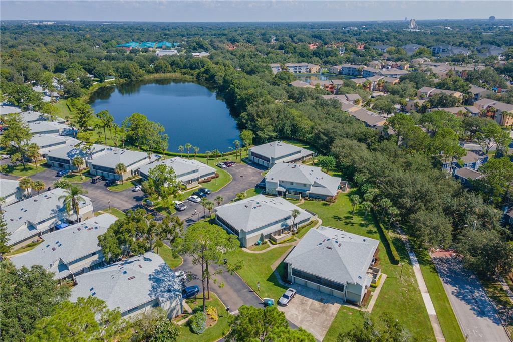 4413 Ring Neck Road, Unit 4413 Orlando, FL 32808 - Photo 24 of 24 an aerial view of residential houses with outdoor space