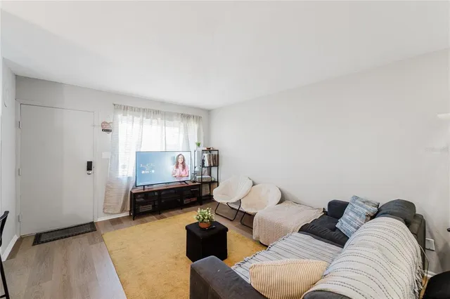 a living room with furniture and a couch