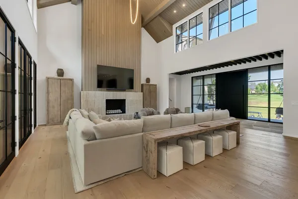a large kitchen with kitchen island a sink counter and chairs