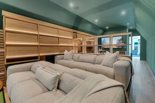 a view of a patio with table and chairs and potted plants