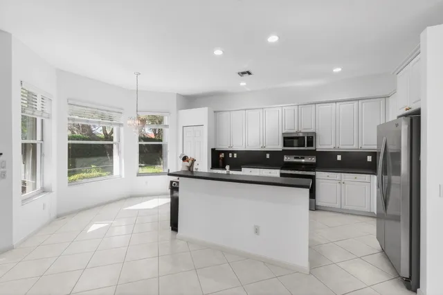 $499,900 | 7102 Prado Lake Drive, Delray Beach, FL 33446