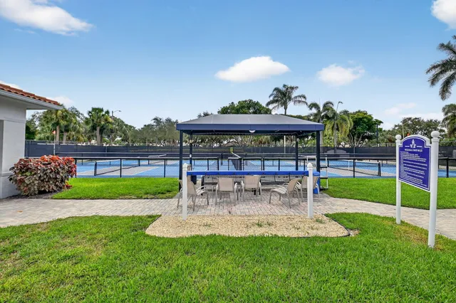 a childrens park with lots of swings and slides