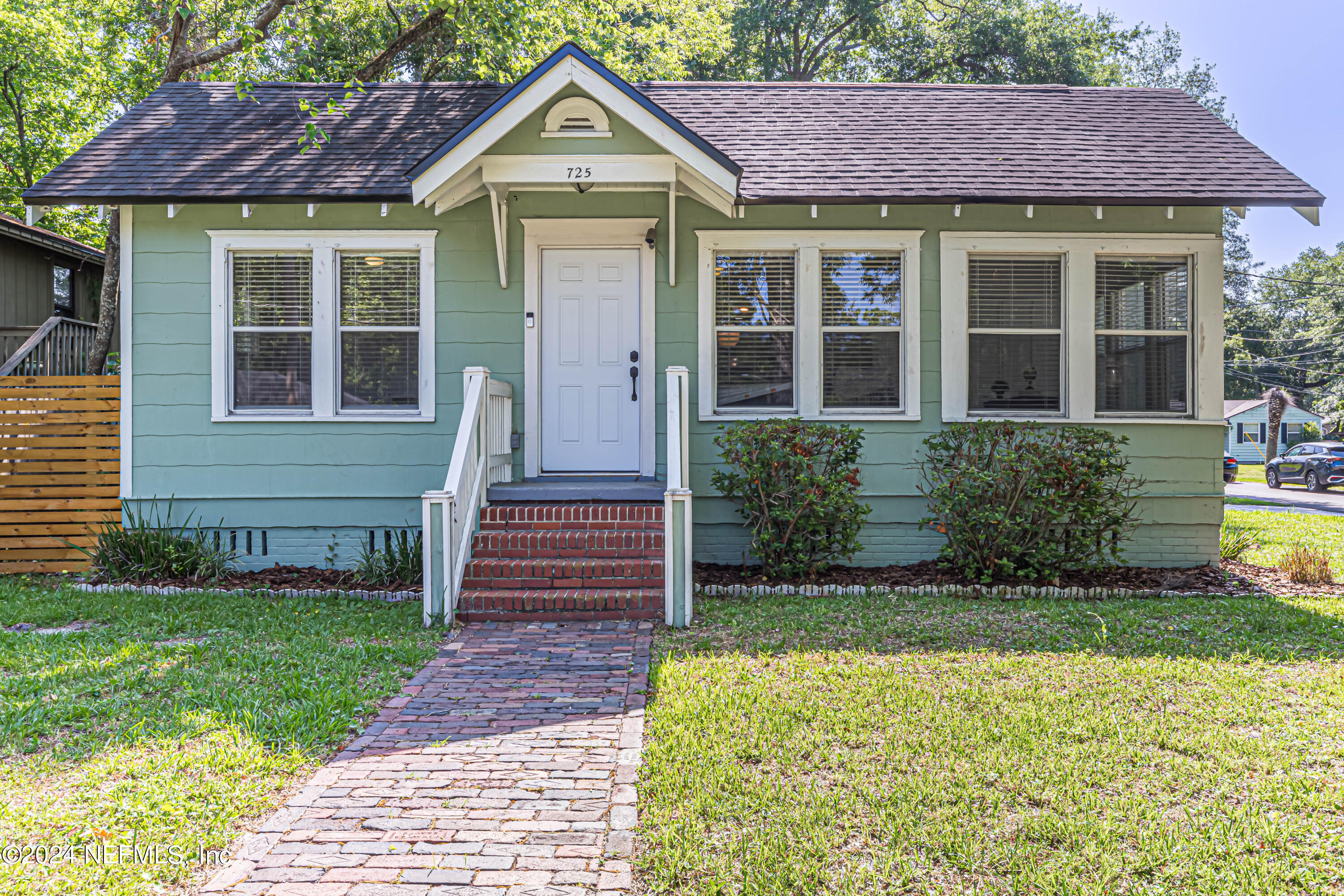 725 Cherokee Street Jacksonville, FL 32205 - Photo 1 of 41 a front view of a house with garden